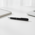 Pocket HD Video Recorder Pen on an office desk