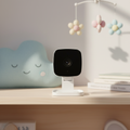 WiFi Baby Monitor and Indoor Camera on a nursery shelf